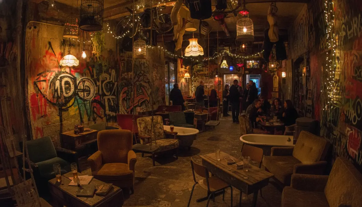 Interior of Szimpla Kert ruin bar in Budapest with eclectic vintage decor
